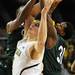 Michigan freshman Nik Stauskas battles Cleveland State sophomore Anton Grady, left, and sophomore Charlie for a rebound during the second half of an NIT Season Tip-Off game at Crisler Center on Tuesday. Melanie Maxwell I AnnArbor.com